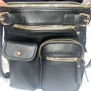 Black Medium Lightweight Crossbody. In new like condition